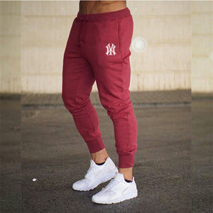 James™ winddichte heren joggingbroek met logoprint